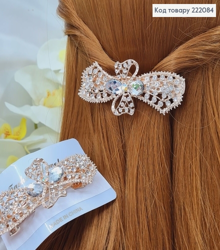 Заколка автомат металл 8,5*3,3см БАНТИК в камінцях золотого кольору 222084 фото 2